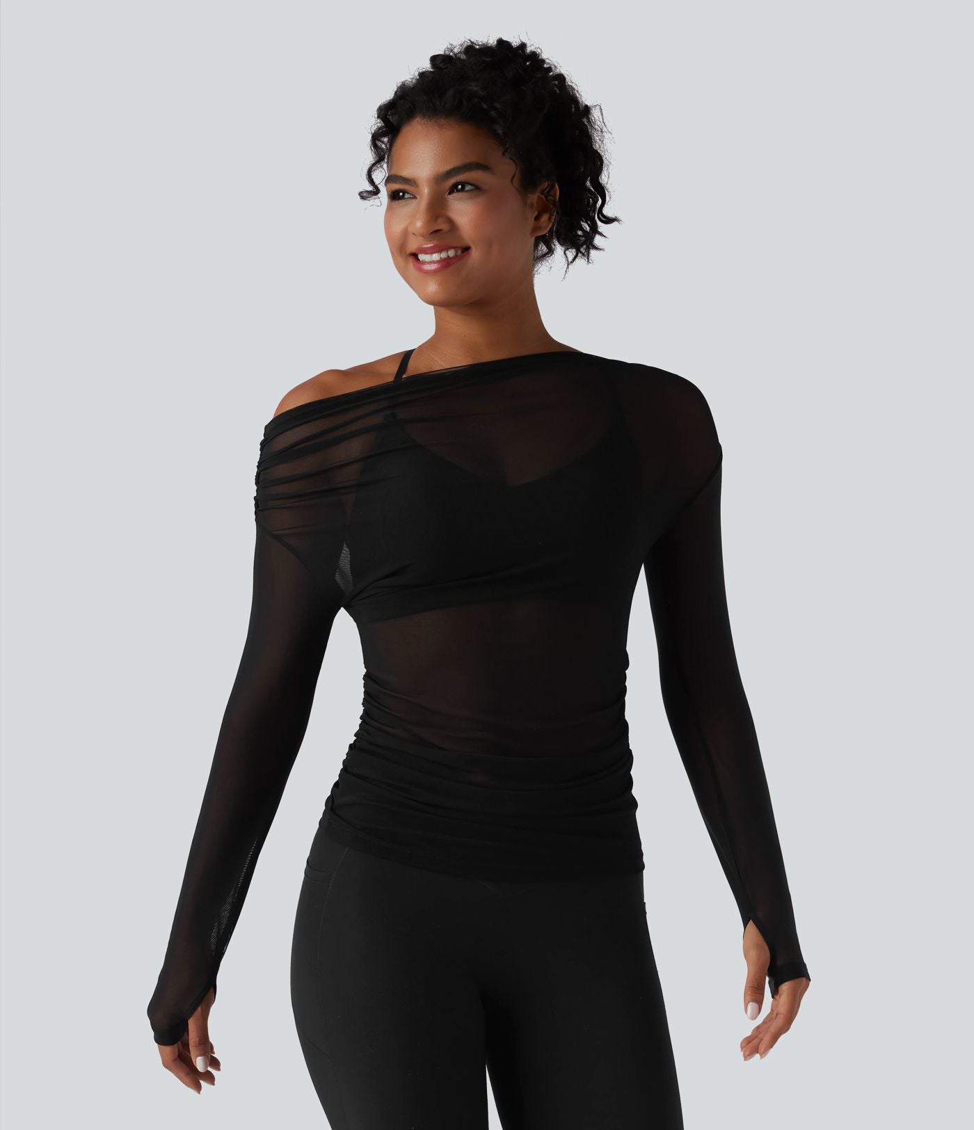 Haut de yoga asymétrique manches longues mesh avec ouverture pouce