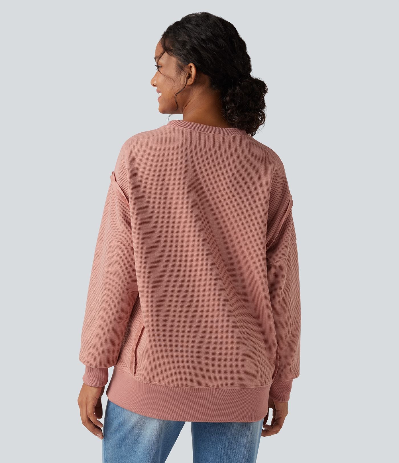 Sweat-shirt gaufré col rond ourlet fendu manches longues