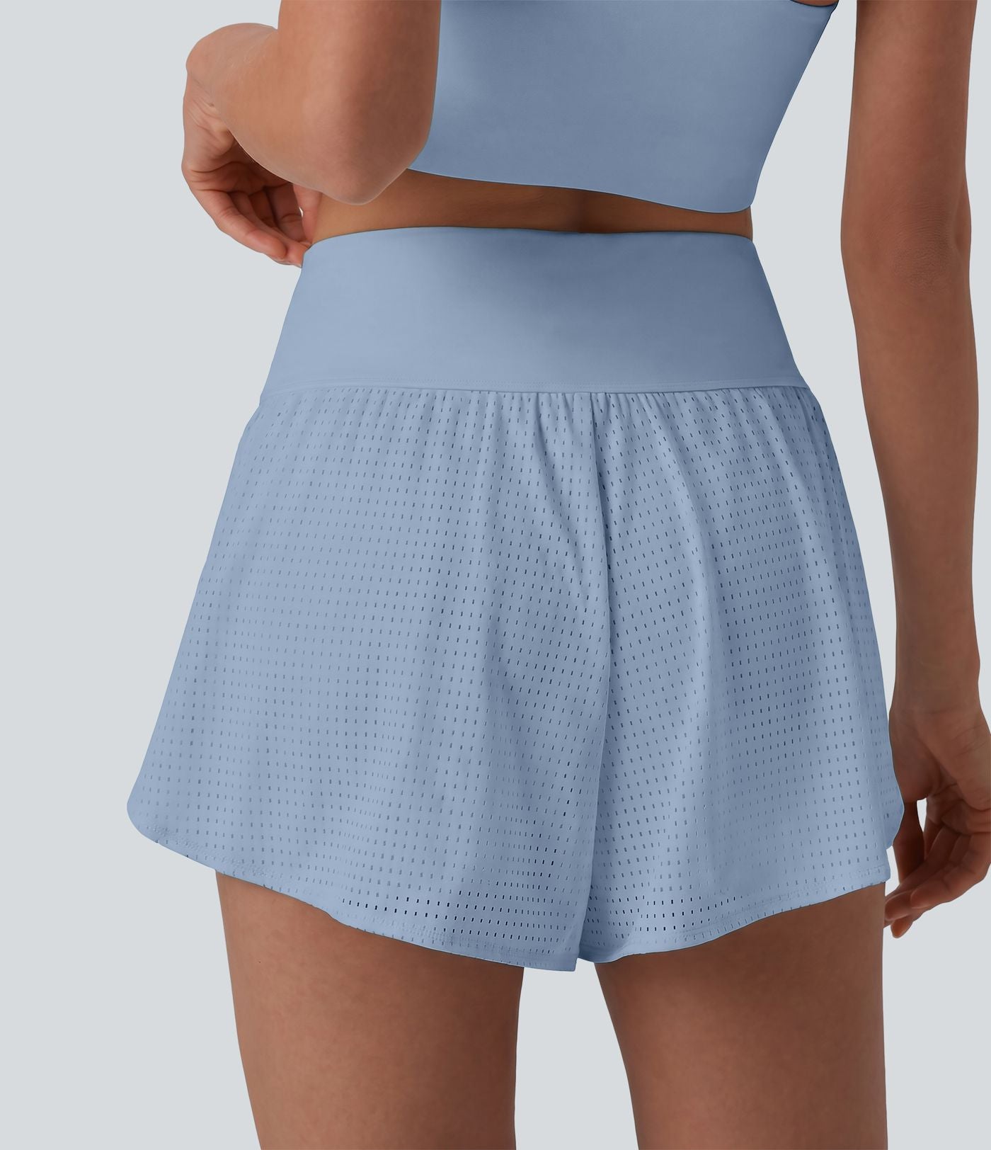 Short yoga 2-en-1 gainant taille haute à pois réfléchissants, ourlet arrondi croisé et œillets avec poches
