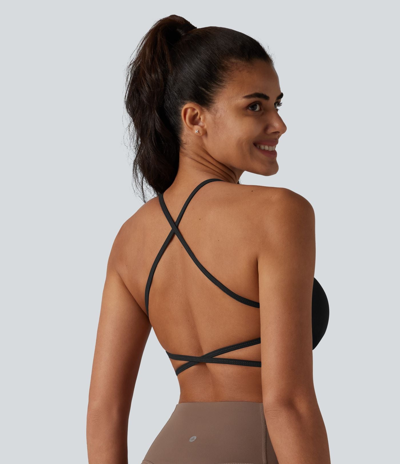 Brassière de sport de yoga en maille côtelée maintien léger dos croisé dos nu avec soutien-gorge intégré