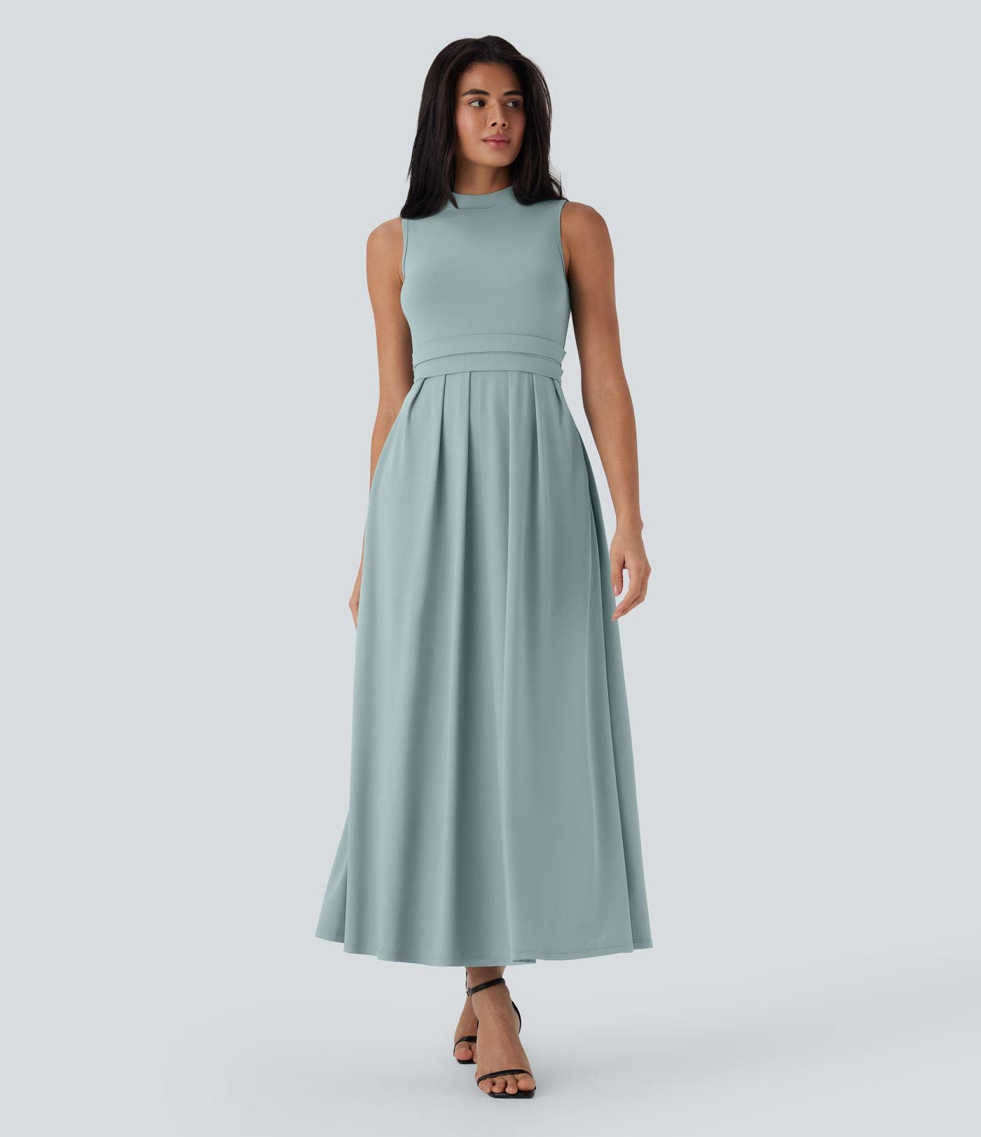Robe longue décontractée sans manches à col montant, coupe évasée et poches latérales
