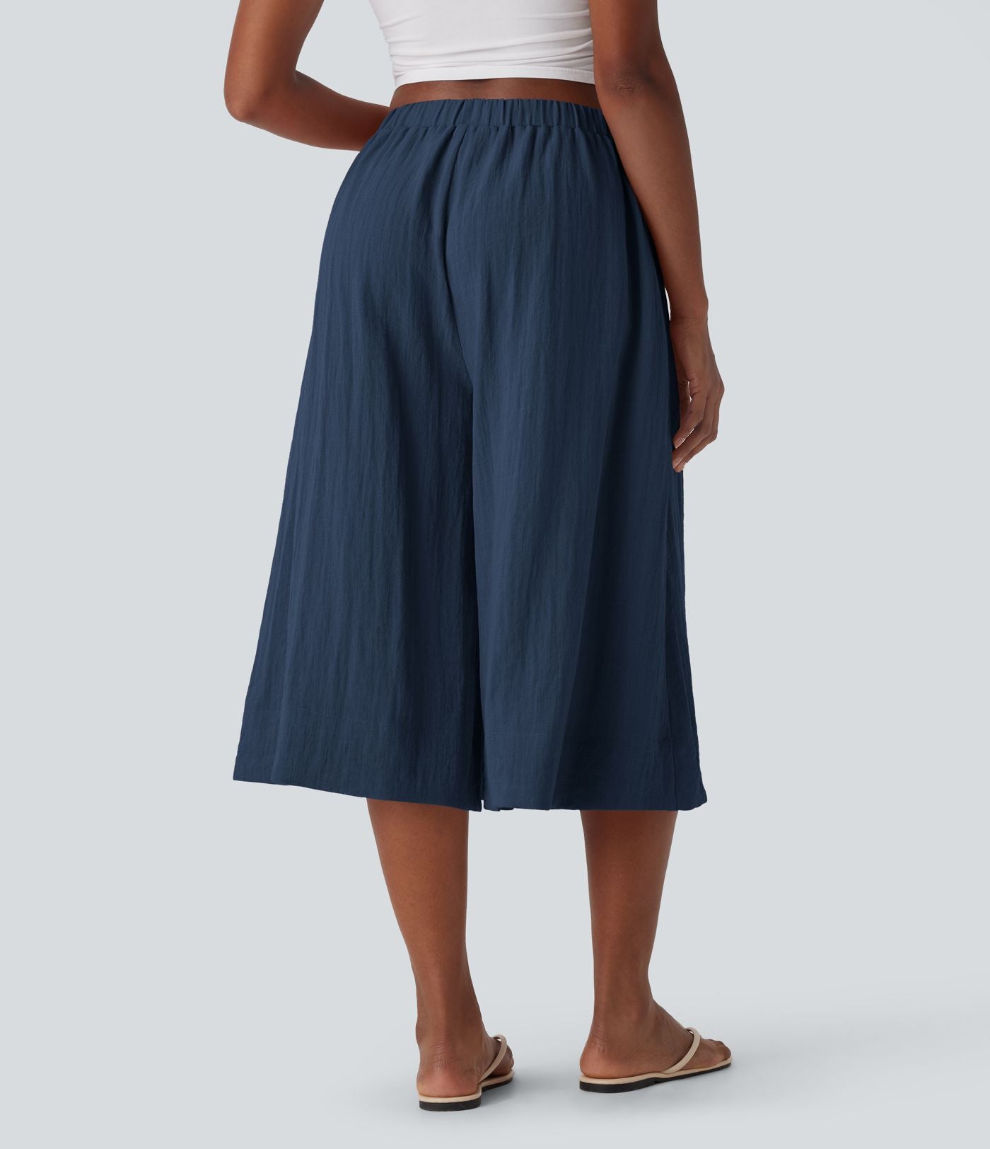 Pantalon fluide large taille mi-haute effet lin avec poche