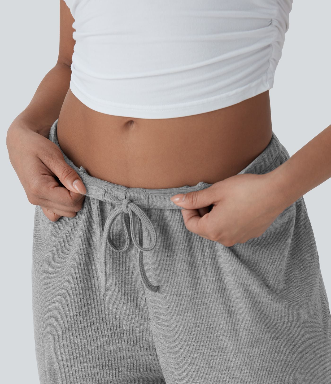 Pantalon fluide ample à taille basse avec cordon de serrage, côtes extensibles, doux pour la peau et poches latérales