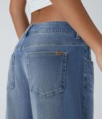 Halara Flex™ Jean large asymétrique taille basse avec bouton, fermeture éclair et poches multiples, délavé et extensible en maille
