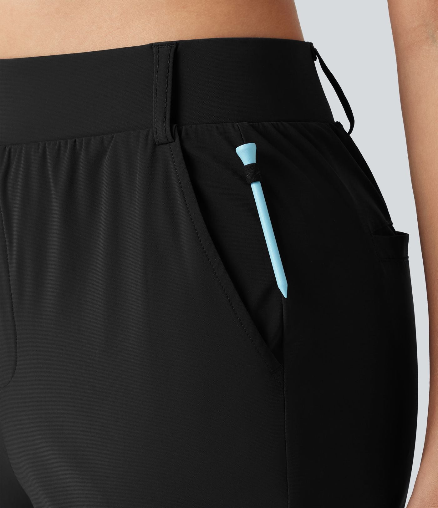 Jogging court taille haute à séchage rapide pour le golf avec poches