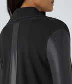 Veste de travail à pans asymétriques, boutons, passants pour pouces, poches latérales et empiècements contrastés