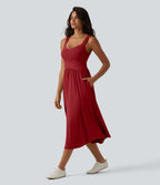 Robe midi fluide sans manches dos croisé, avec brassière intégrée (Bonnets E-G) et poches