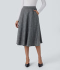 Jupe midi évasée à taille haute et poches latérales, motif pied-de-poule