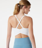 Caraco de yoga court col rond échancré avec brassière intégrée et ourlet croisé