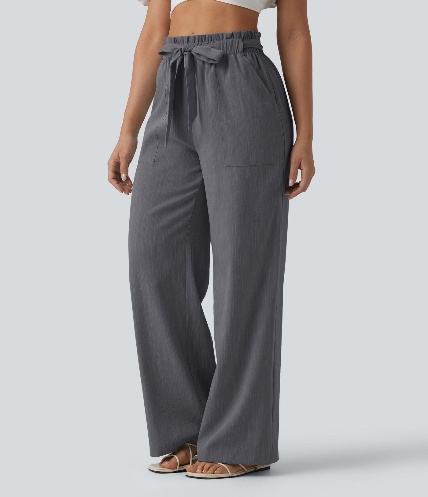 Pantalon décontracté effet lin taille haute, coupe droite, ceinturé avec finitions ondulées et poches