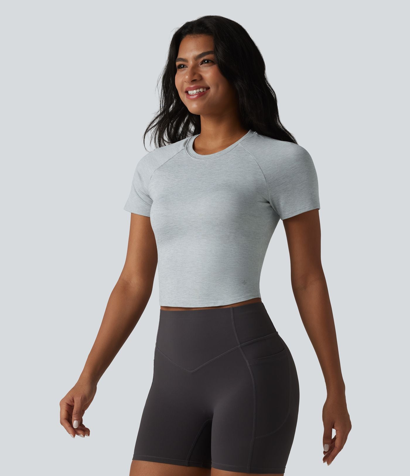 Haut de sport yoga col rond manches courtes avec soutien-gorge intégré
