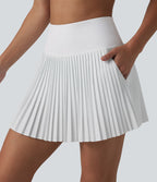 Breezeful™ Jupe mini de tennis plissée 2 en 1 taille haute séchage rapide avec poches