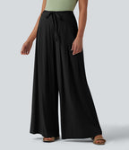 Pantalon large fluide taille mi-haute aspect lin avec ceinture et poches