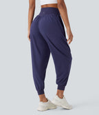 Pantalon de yoga croisé taille haute à séchage rapide Breezeful™ avec poches latérales