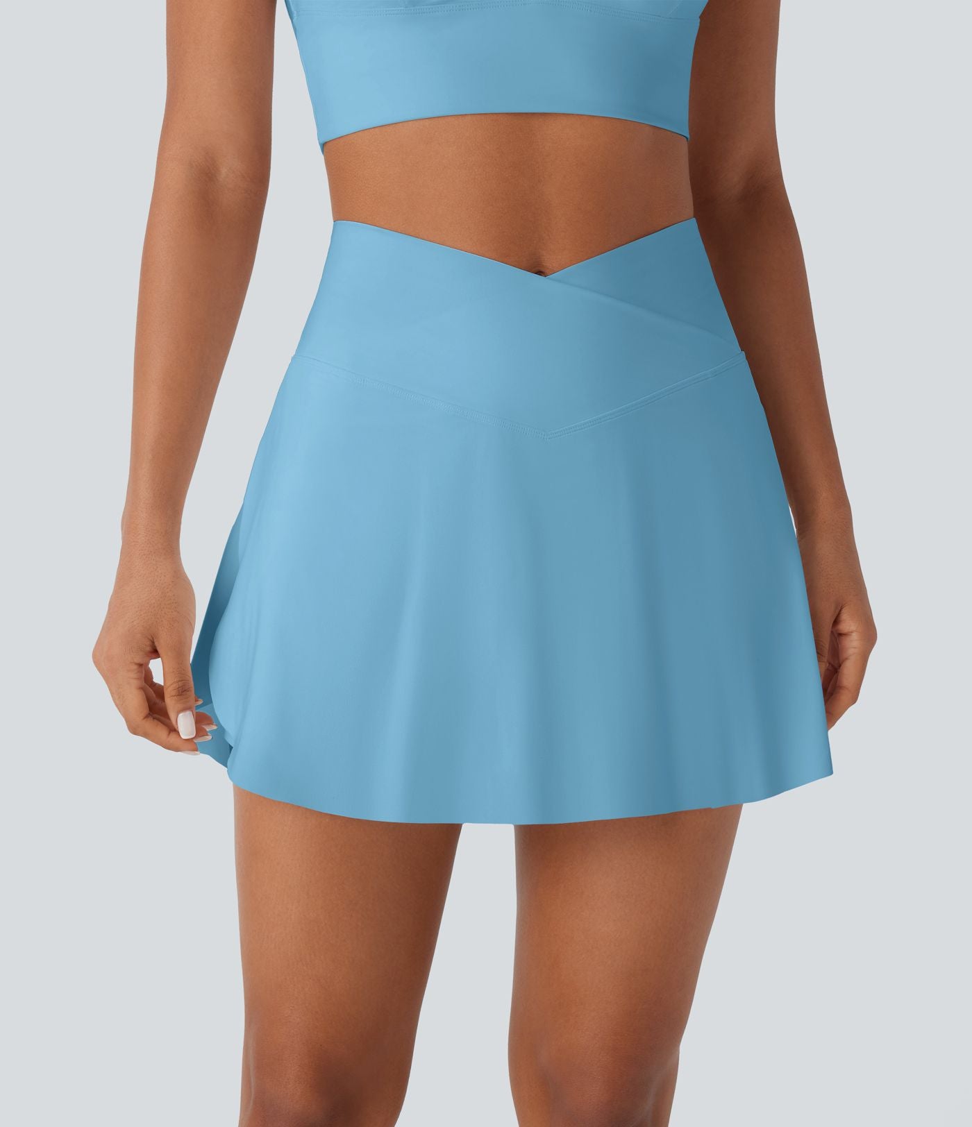 Jupe-short 2-en-1 mini de vacances taille haute croisée à séchage rapide avec poches latérales effet frais InstantCool