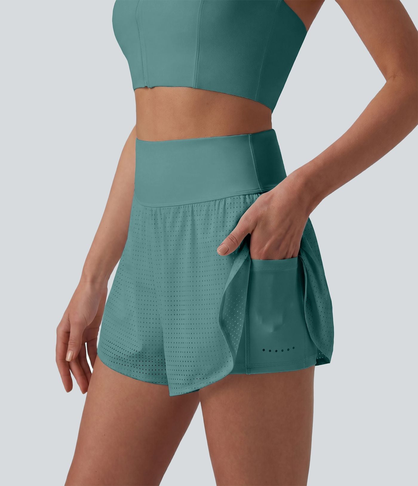 Short yoga 2-en-1 gainant taille haute à pois réfléchissants, ourlet arrondi croisé et œillets avec poches