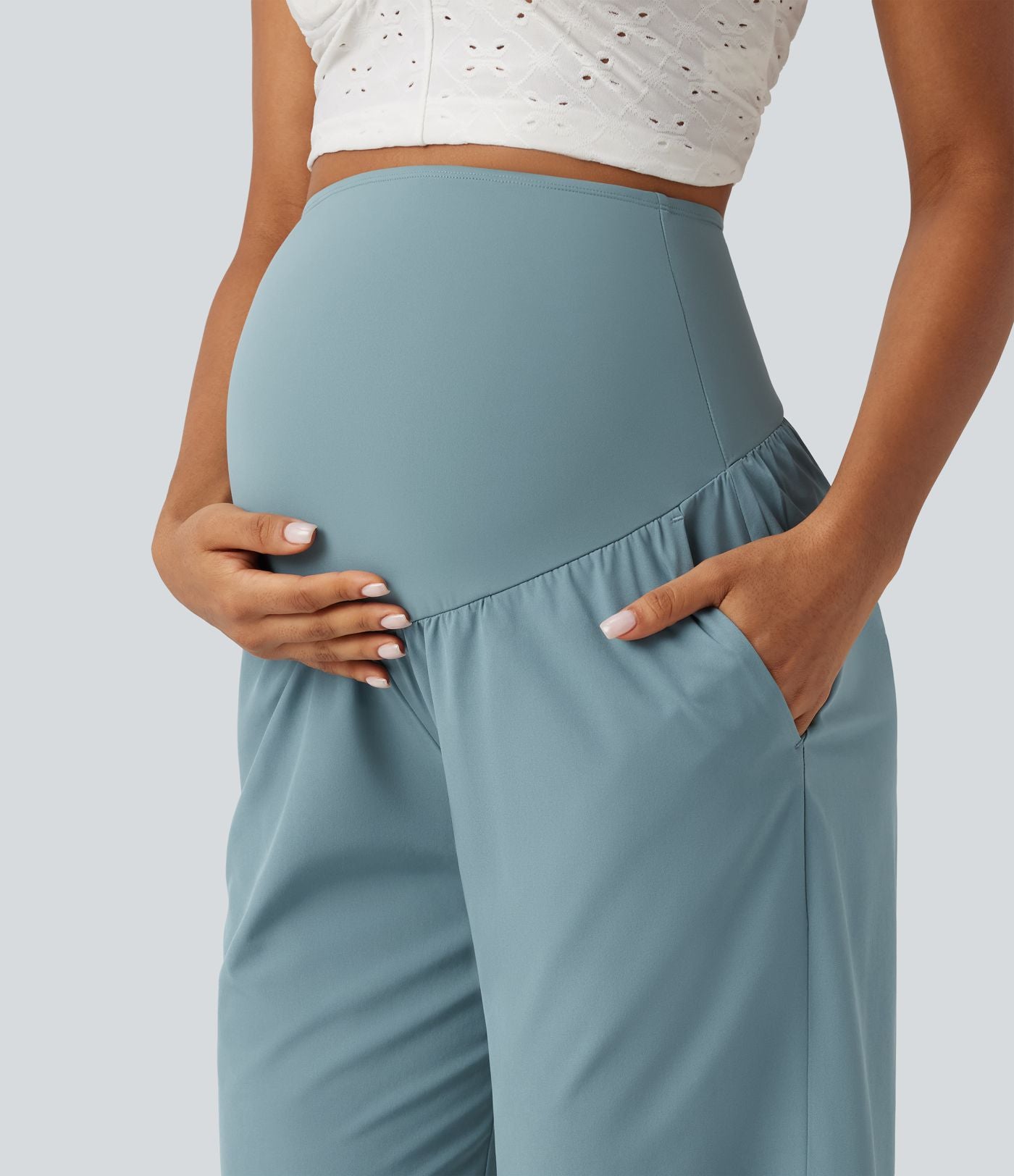 Pantalon corsaire de grossesse super taille haute en Breezeful™ à ourlet incurvé et séchage rapide avec poches