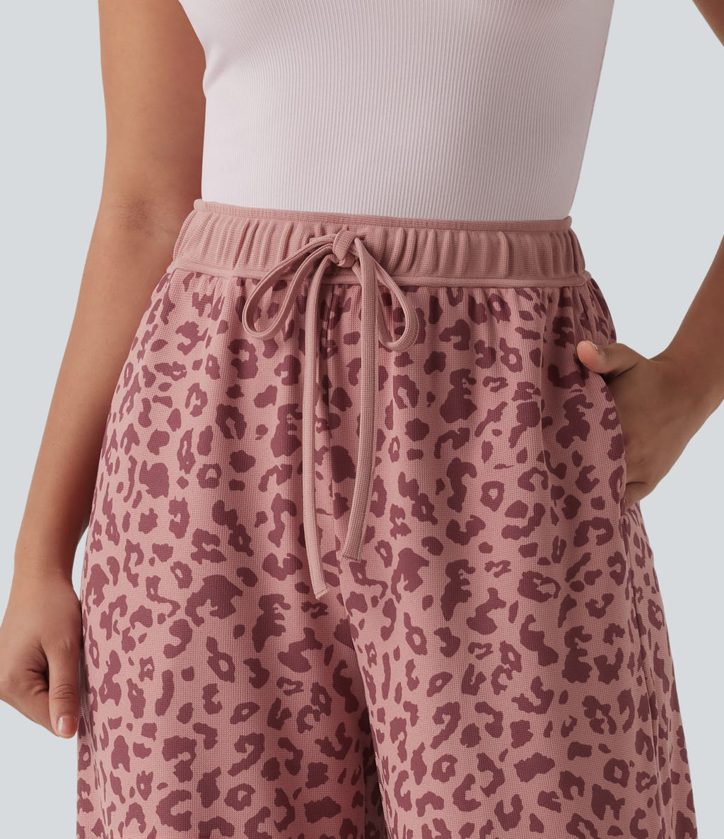 Pantalon casual large gaufré imprimé léopard taille haute avec cordon de serrage et poches