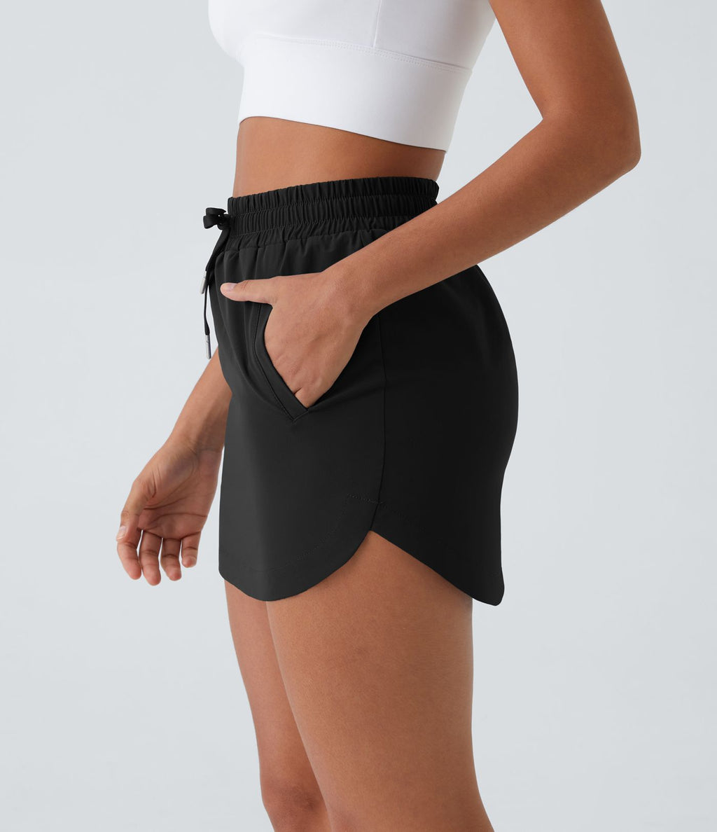 Mini-Jupe Golf Taille Haute Cordon de Serrage Poches Latérales Ourlet Courbé 2 en 1