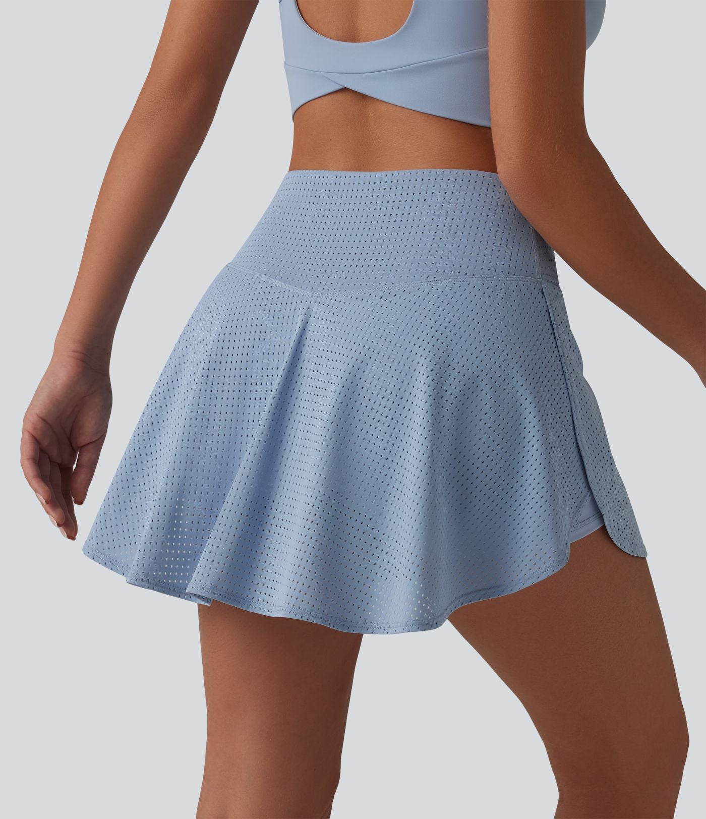 Jupe mini de tennis à œillets, taille haute, 2 en 1, coupe trapèze, croisée, avec poches