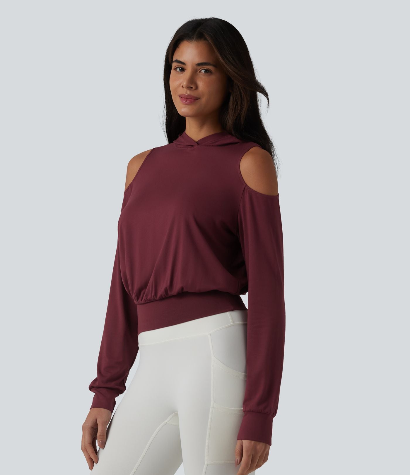 Sweat-shirt de sport à capuche épaules dénudées manches longues