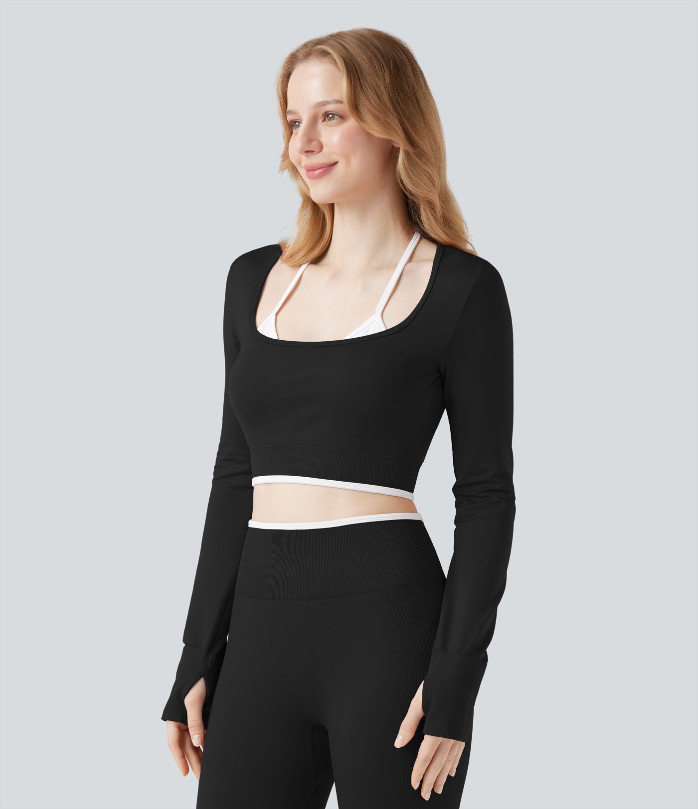 Haut de sport yoga court dos nu à manches longues avec passants pouces et blocs de couleurs sans coutures Seamless Flow