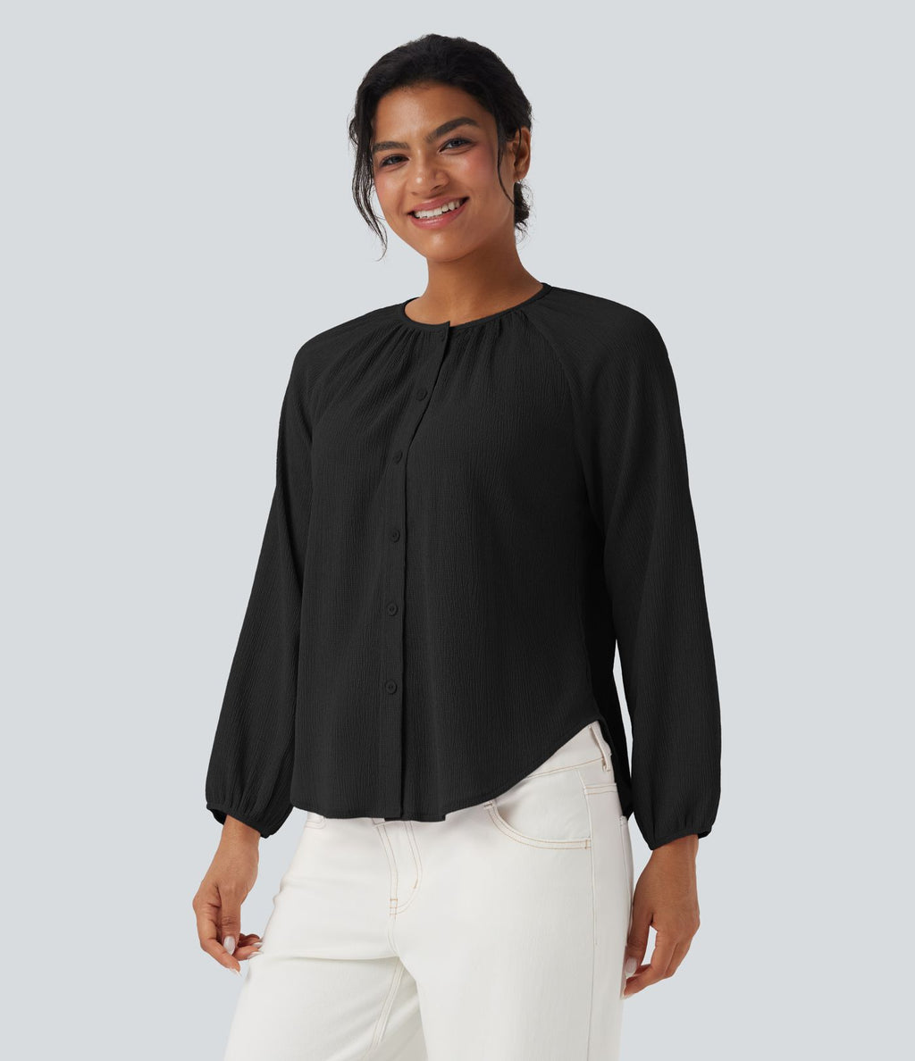Blouse texturée col rond manches longues ourlet arrondi