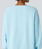 Sweat-shirt gaufré henley oversize manches longues avec poches