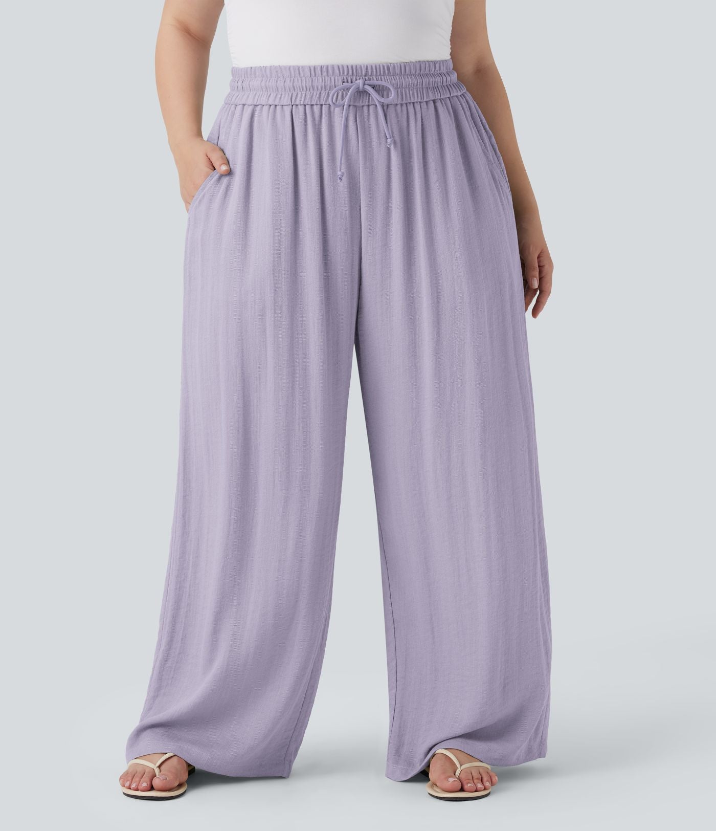 Pantalon décontracté grande taille large fluide taille haute effet lin avec cordon de serrage et poches