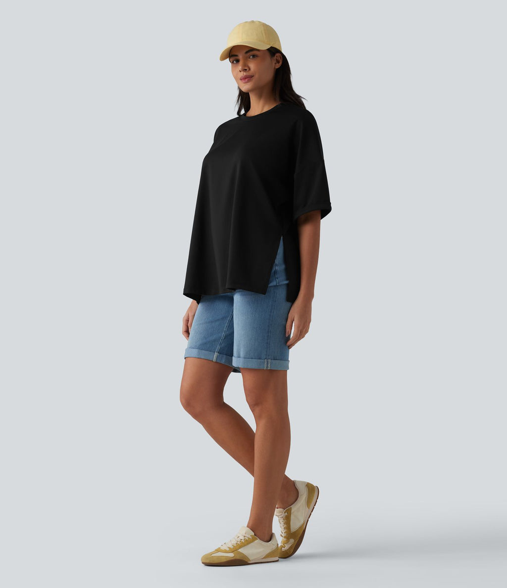 T-shirt décontracté col rond manches retroussées avec ourlet fendu