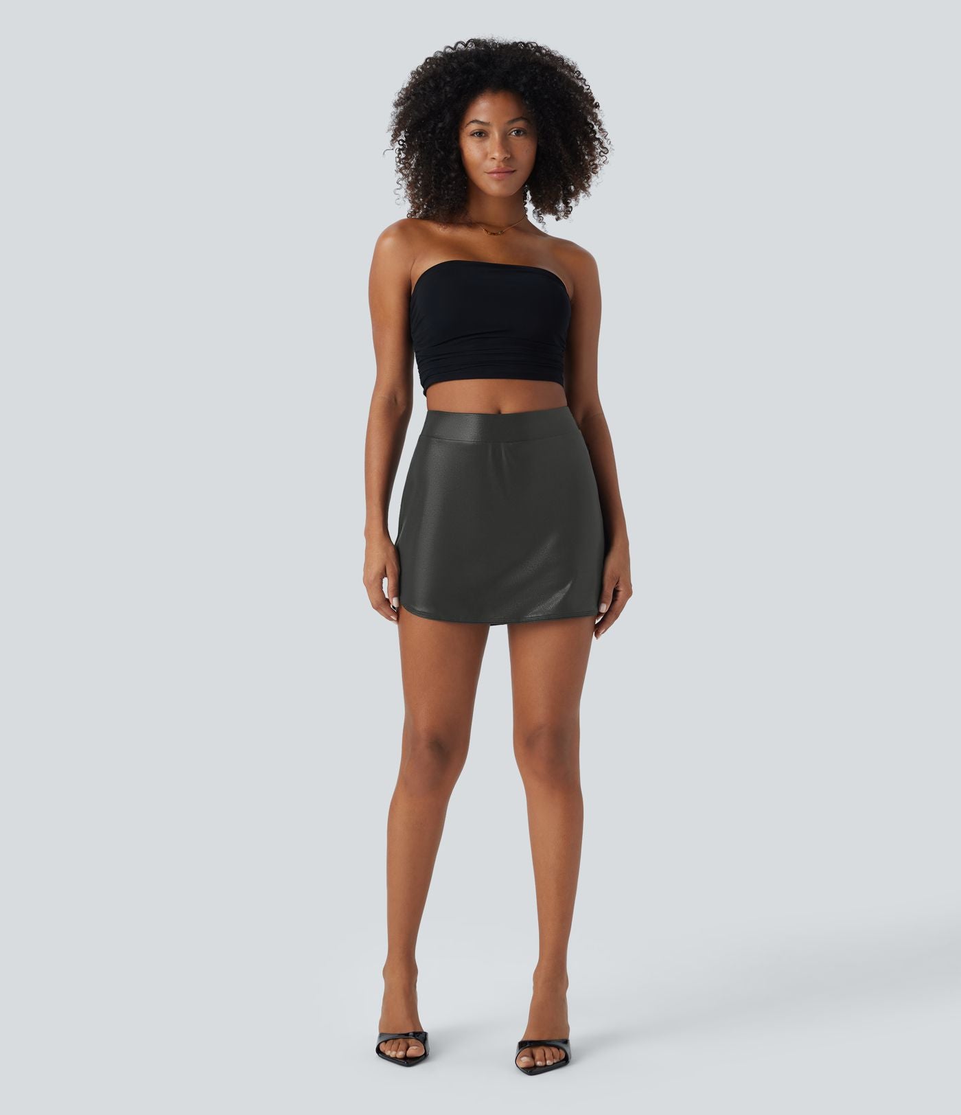 Mini-jupe moulante 2-en-1 SoftlyZero™ taille haute en simili, ourlet courbé, effet sparkle métallisé, avec poches