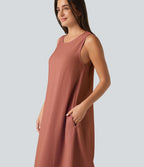 Robe débardeur midi unie sans manches à col rond et poches