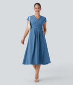 Robe midi Breezeful™ col V manches courtes à liens dans le dos séchage rapide avec poches latérales