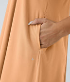 Robe décontractée mi-longue Breezeful™ dos nageur poche latérale fluide asymétrique séchage rapide A-C
