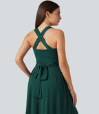Robe longue fluide décontractée sans manches décolleté en cœur bretelles croisées avec lien dans le dos et poches