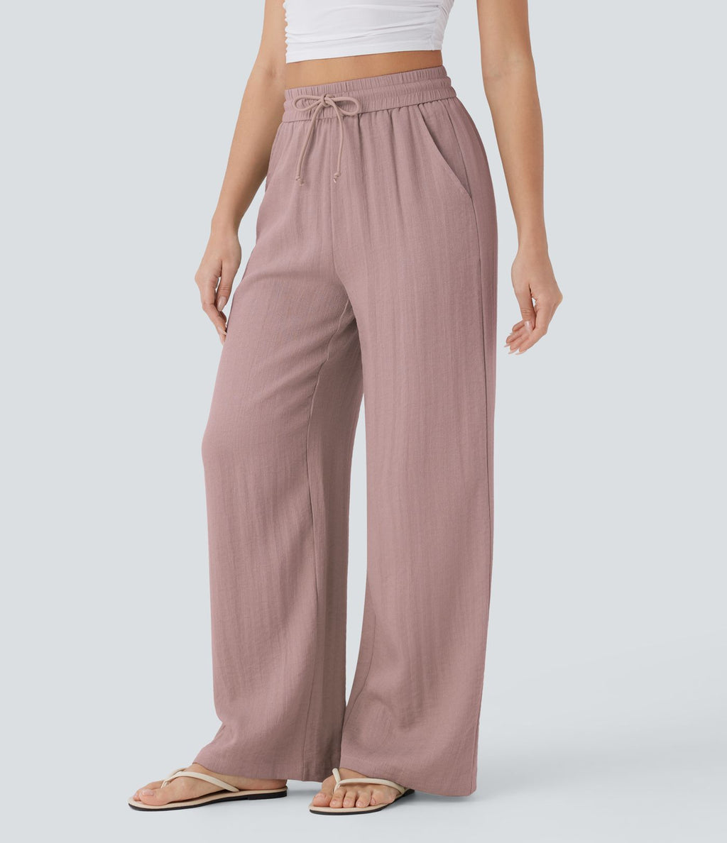 Pantalon large fluide taille haute avec cordon de serrage, poches latérales et aspect lin