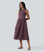 Robe midi de villégiature sans manches col rond à broderie anglaise, avec poches