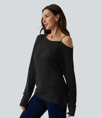 T-shirt décontracté semi-transparent une épaule dénudée à manches longues et ourlet asymétrique