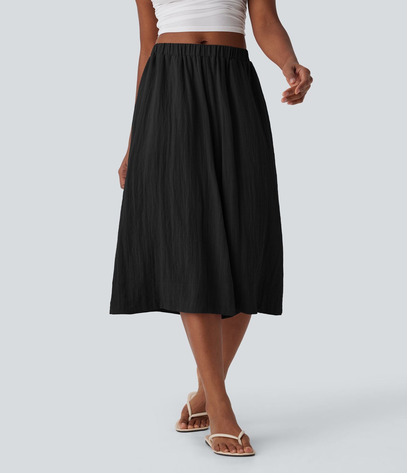 Pantalon fluide large taille mi-haute effet lin avec poche