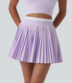 Jupe mini de tennis plissée 2-en-1 Breezeful™ color block taille haute à séchage rapide avec poches