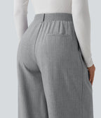 Pantalon tailleur large taille haute avec poches