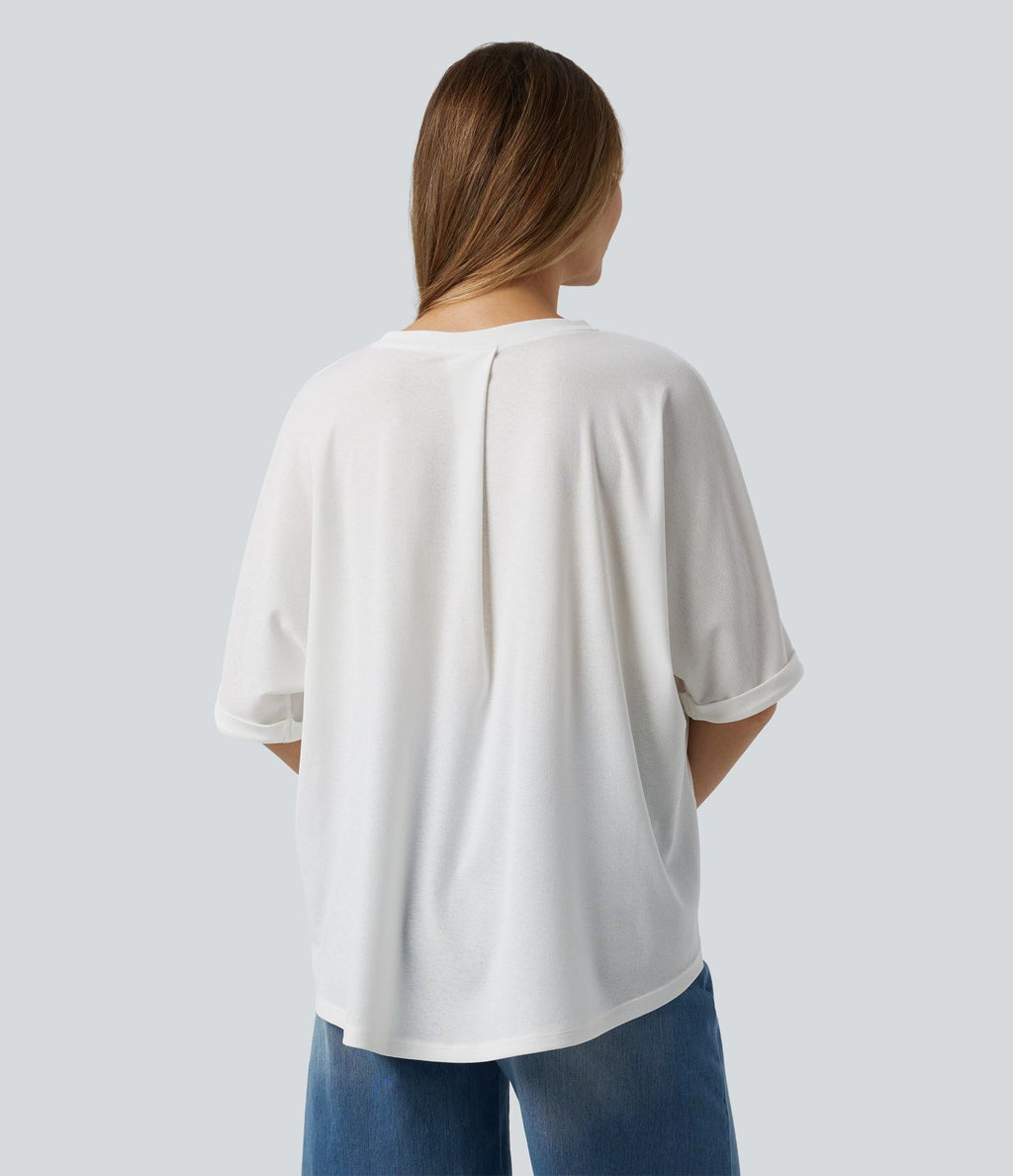 T-shirt décontracté col rond manches mi-longues ourlet asymétrique