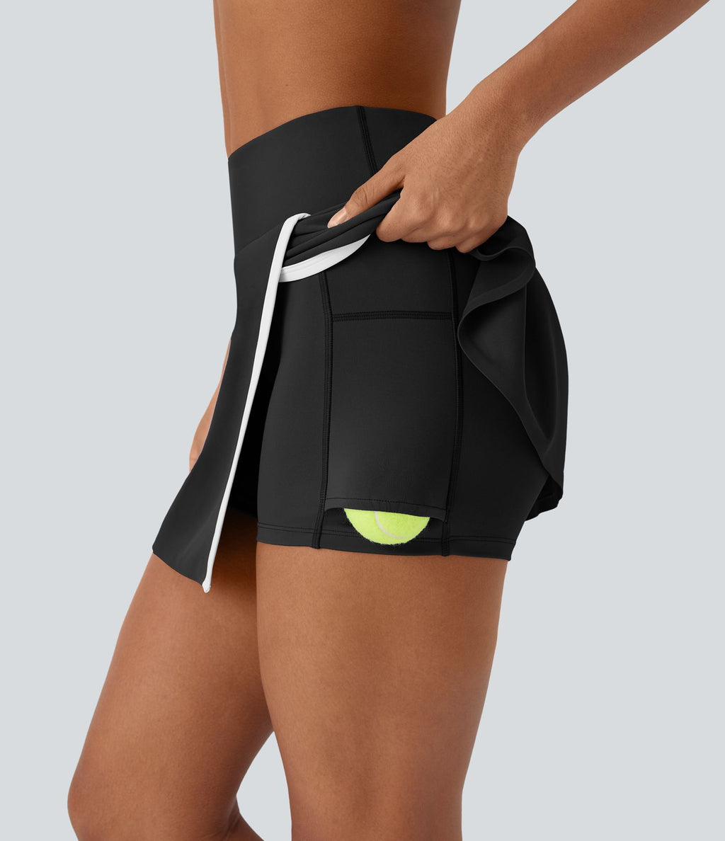 Jupe de tennis mini 2-en-1 à taille haute, fente, blocs de couleur et poche latérale