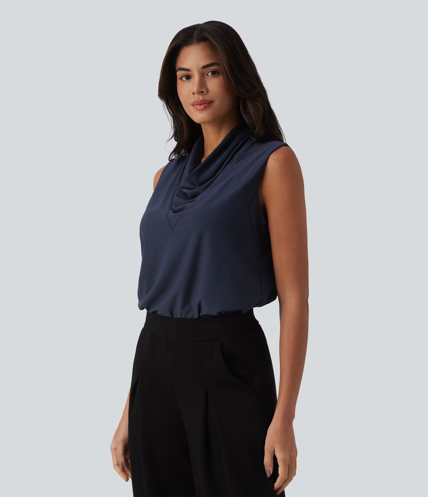 Blouse de travail sans manches à col drapé