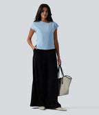 Blouse tailleur asymétrique col drapé manches courtes avec fronces et ourlet fendu