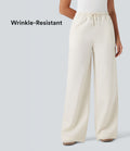 Pantalon décontracté large effet lin taille haute infroissable avec cordon et poches
