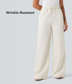 Pantalon décontracté large effet lin taille haute infroissable avec cordon et poches