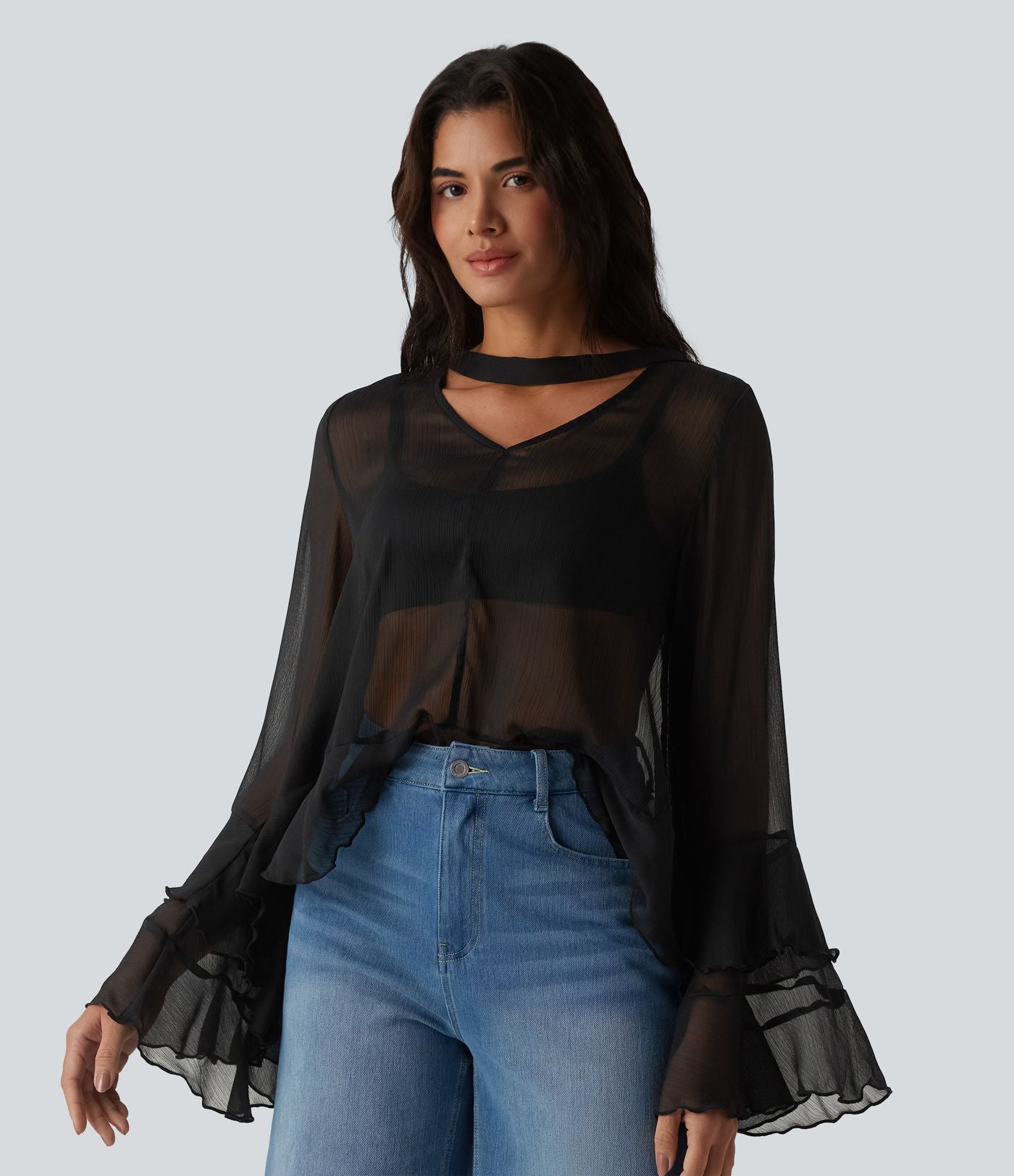 Chemise casual transparente col V manches longues à volants