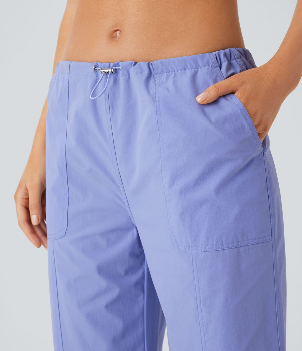 Pantalon de yoga déperlant résistant à l'usure taille basse avec cordon ajustable, poches latérales et jambes droites