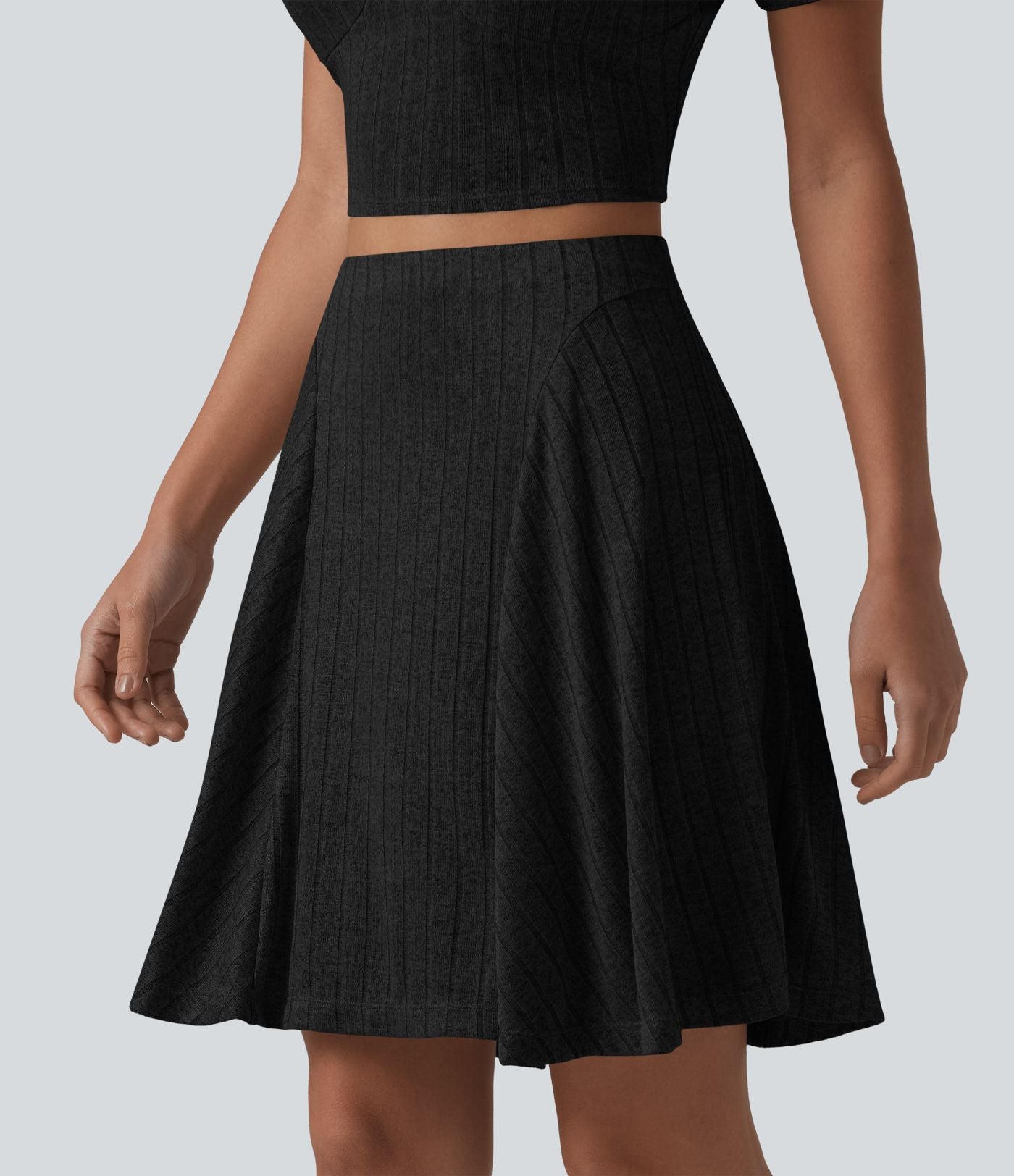 Jupe mini évasée casual 2 en 1 en maille côtelée taille haute avec poches